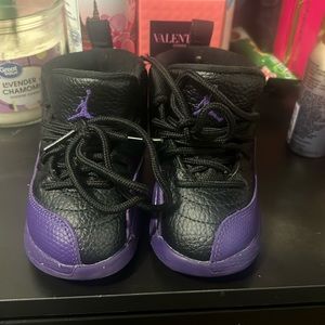 Black and purple Jordans